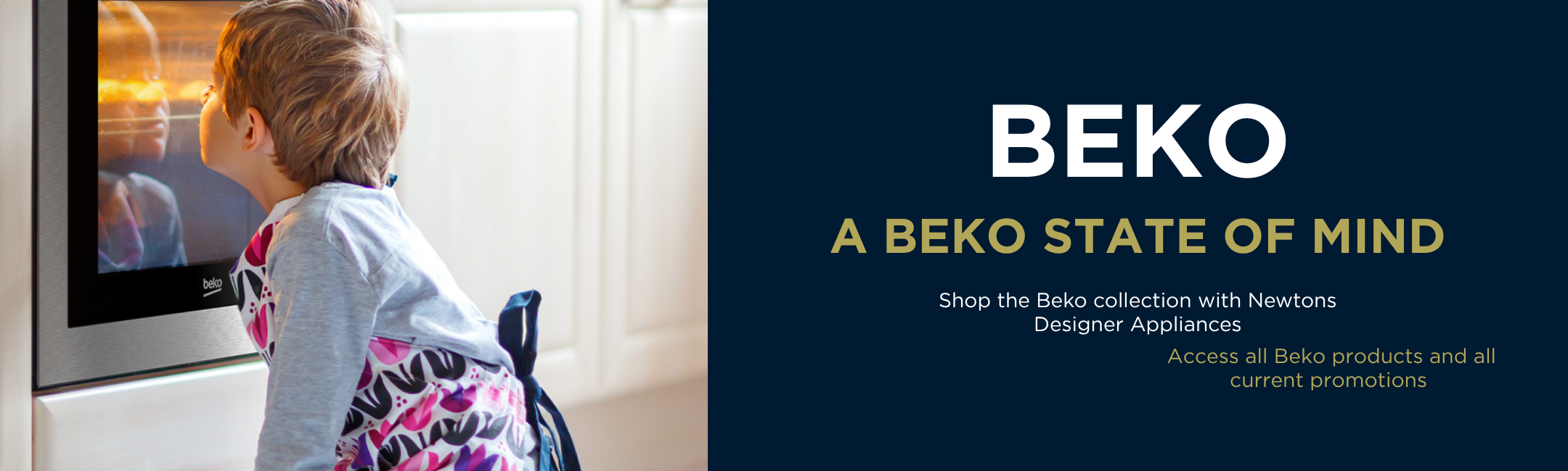 Child watching food bake in a Beko oven, modern kitchen setting with designer appliances