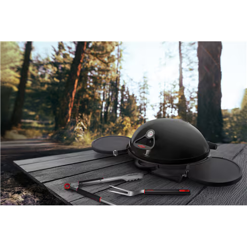 Lifestyle imagine of Beef Eater Bugg 2 Burner Benchtop BBQ on a wooden picnic table with bbq utensils.