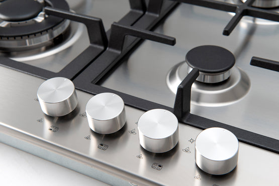Euro 60cm Gas Cooktop ECT60WCXclose up of circular knobs with semi rapid gas burner in background.