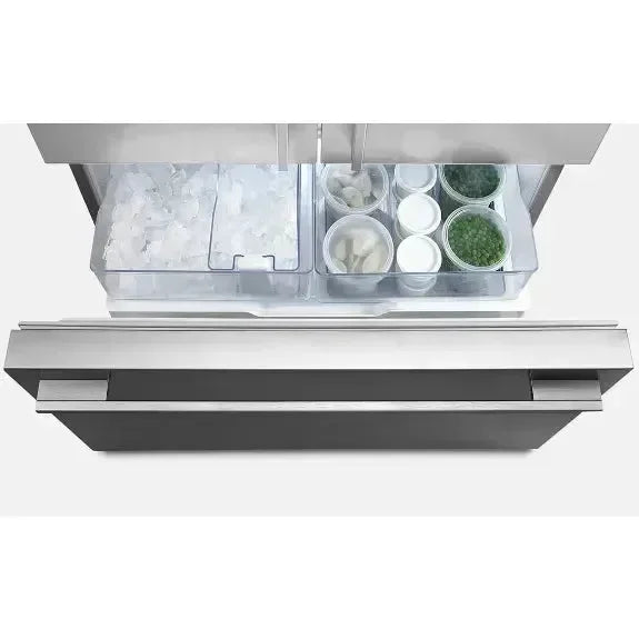 Freezer drawer with organized ice and food containers, modern kitchen appliance detail