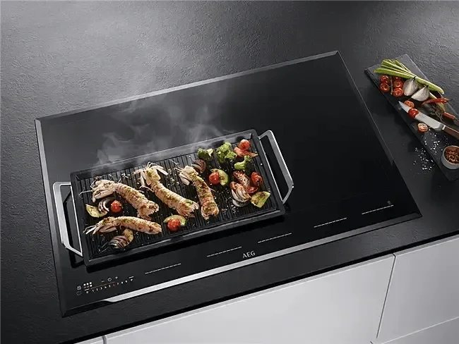 Falcon premium European Glass Black Upright 1100mm Induction Cooker with grilling seafood and vegetables