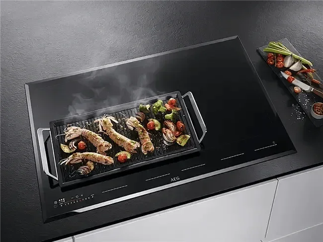 Falcon premium European Glass Black Upright 1100mm Induction Cooker with grilling seafood and vegetables