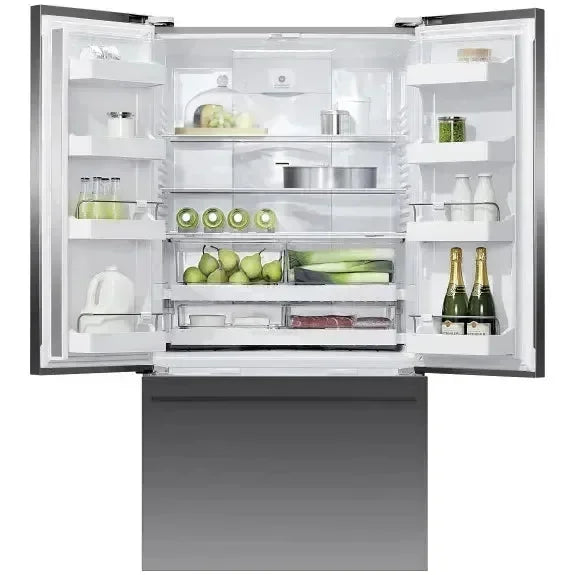 Modern French door refrigerator open, fully stocked with assorted food and drinks