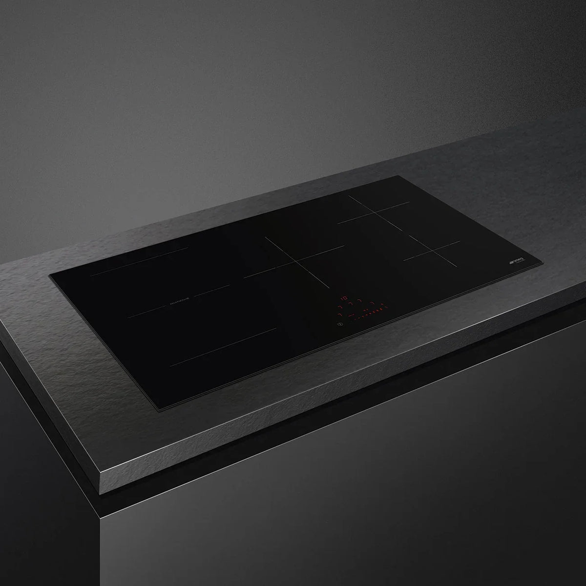 Smeg 90cm Classic 5 Zone Induction Cooktop with touch controls integrated into a dark countertop