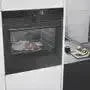 Falcon premium European glass black 1100mm induction cooker in modern kitchen setting