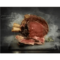 Juicy roasted meat on slate platter with steam, perfect for gourmet kitchen appliances