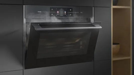 Falcon premium European glass black upright 1100mm induction cooker in modern kitchen