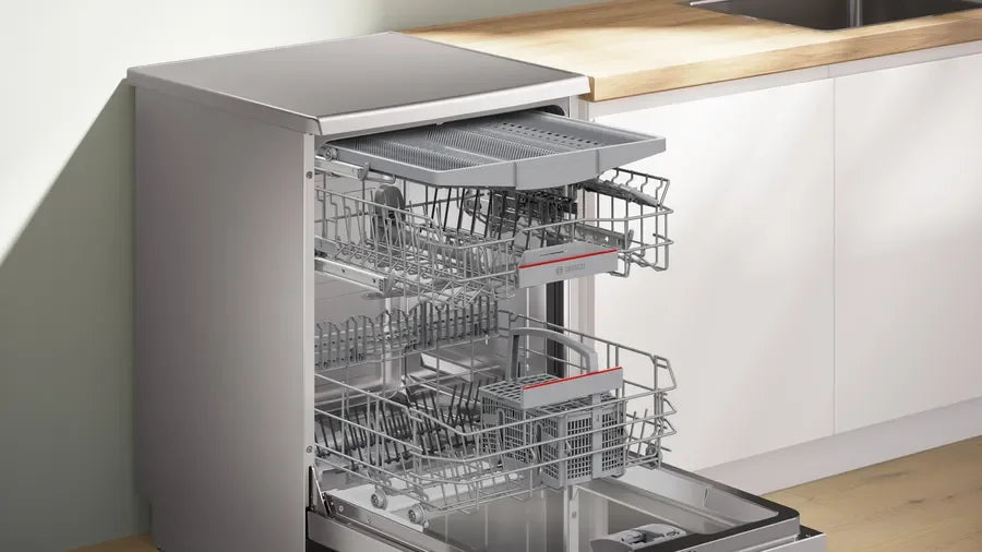 Stainless steel dishwasher with open racks in modern kitchen, sleek design for home appliance gallery