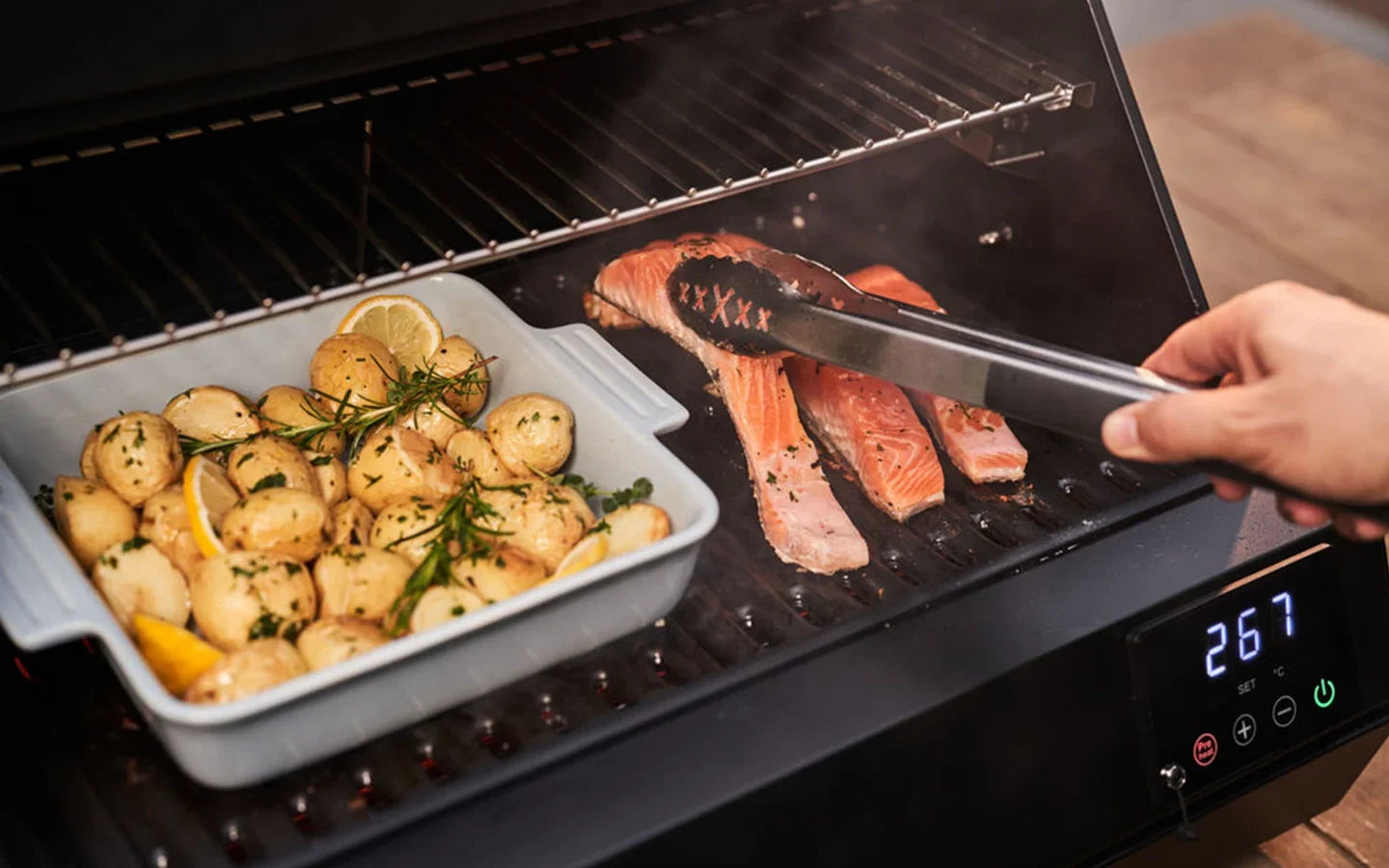 Falcon premium European glass black upright 1100mm induction cooker grilling salmon and potatoes