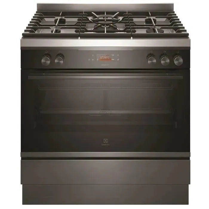 Stainless steel gas range with digital display and oven, perfect for modern kitchen appliance upgrades