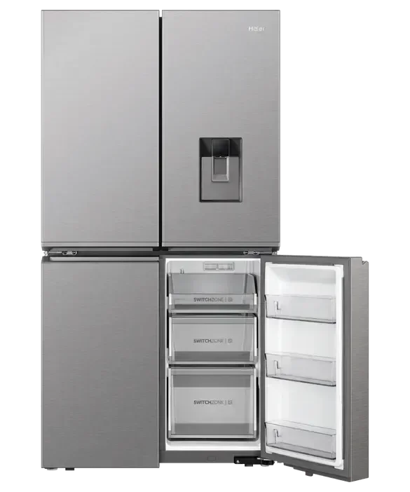 Stainless steel French door refrigerator with open freezer drawers and water dispenser