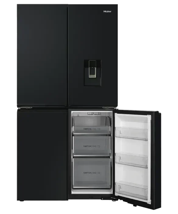 Black Haier French door refrigerator with open freezer drawers and water dispenser