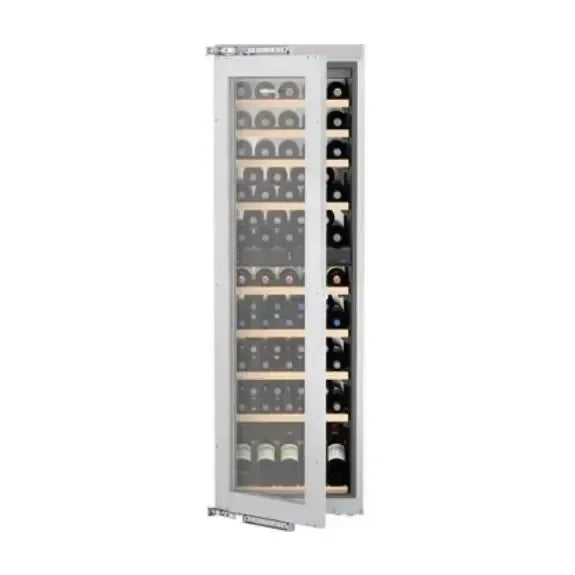 Built-in wine cooler with glass door, displaying organized wine bottles for modern kitchen design