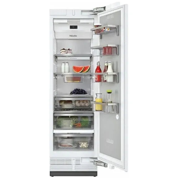 Miele built-in refrigerator with open door, showcasing organized shelves, fresh produce, and beverages for modern kitchen design.