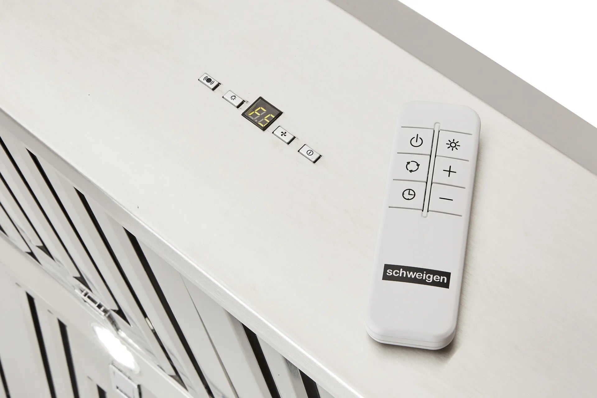 Schweigen Silent BBQ Alfresco Rangehood 150cm showing close up of buttons and remote