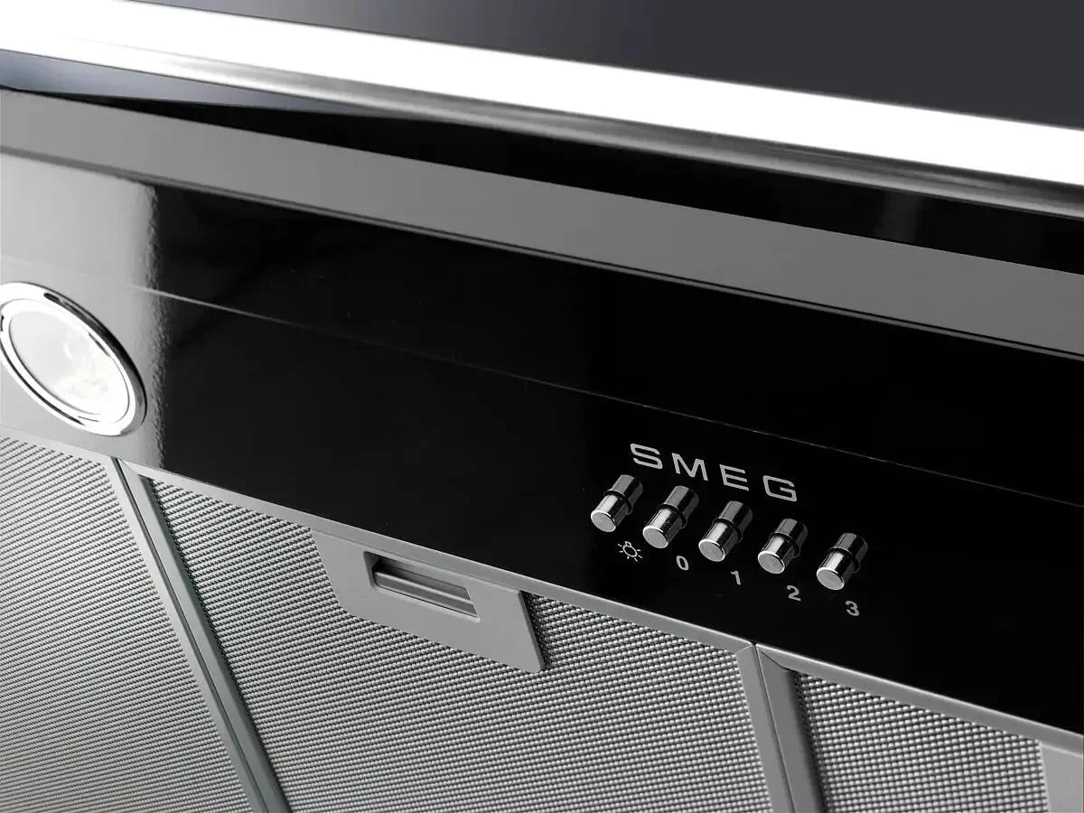 SMEG black glass induction cooker with chrome knobs and control panel