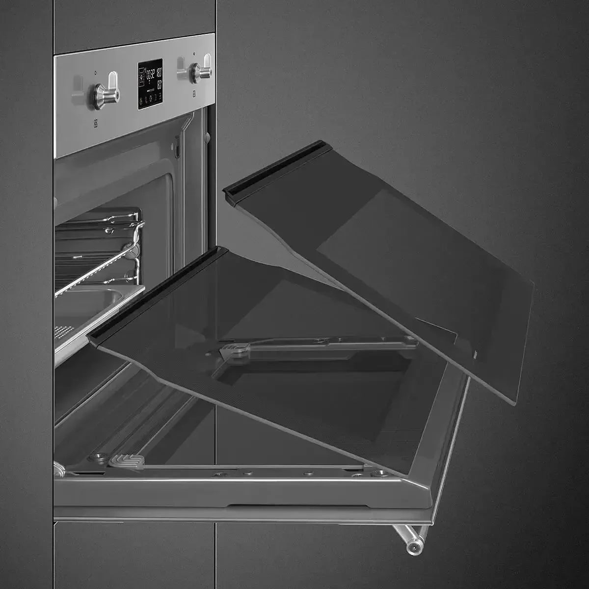 Modern built-in oven with open glass door, digital display, and stainless steel interior for designer kitchens