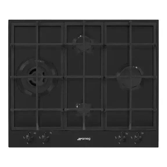Black Smeg gas cooktop with four burners and control knobs, sleek kitchen appliance design