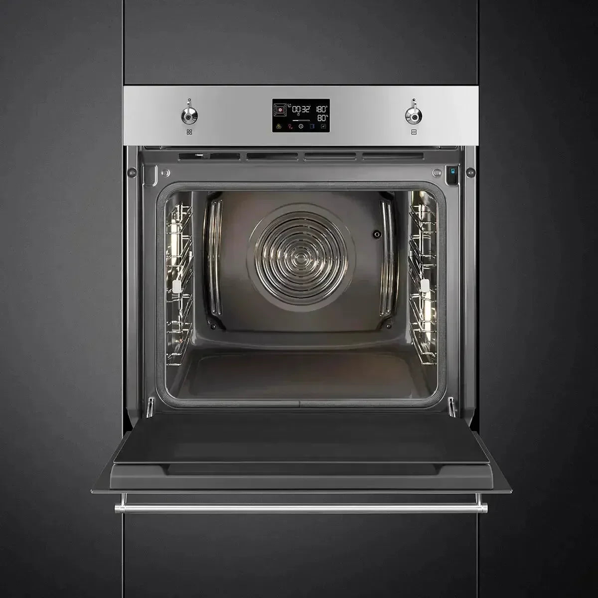 Modern built-in oven with digital display and open door, showcasing interior racks and convection fan for designer kitchens.