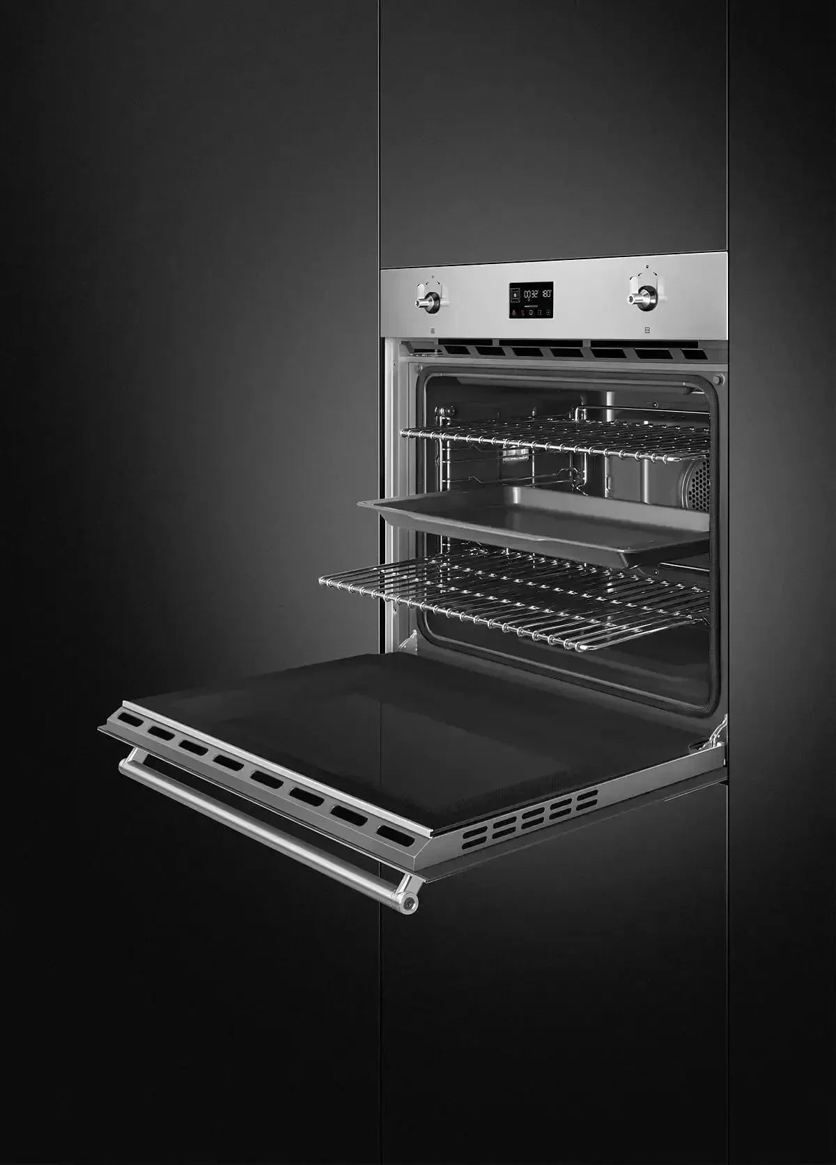 Stainless steel built-in oven with open door, interior racks, and digital display in modern kitchen