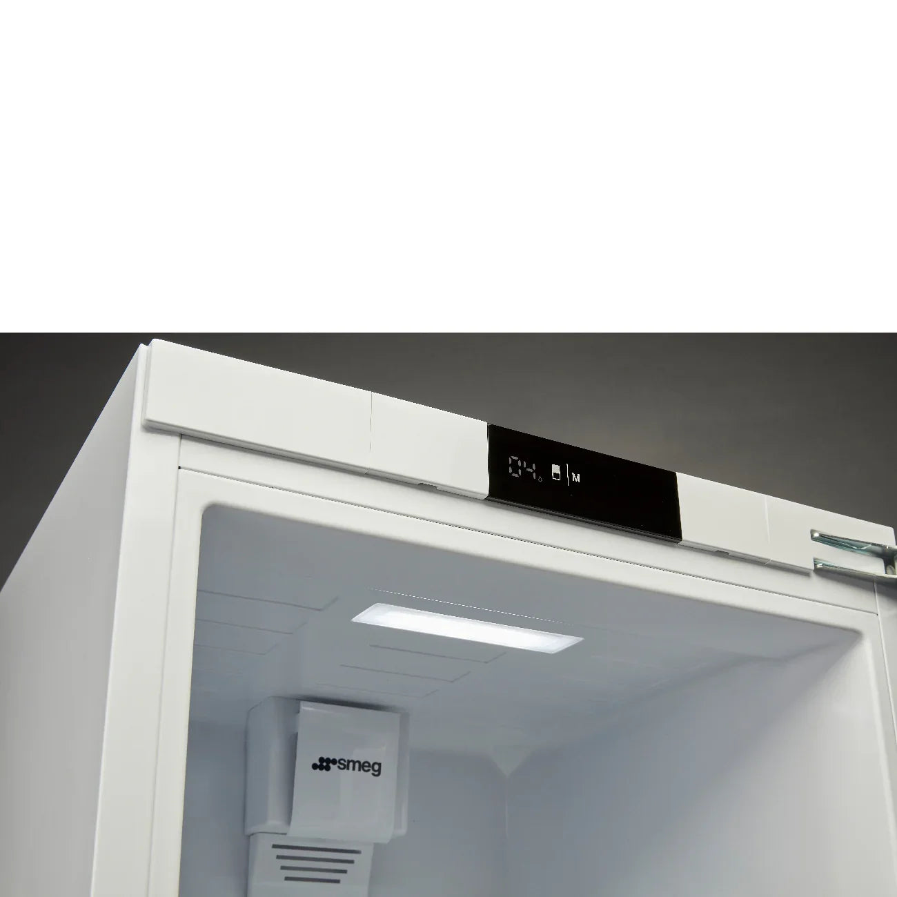 Smeg refrigerator interior with digital display and sleek white design