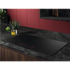 AEG 90cm induction cooktop in dark marble bench