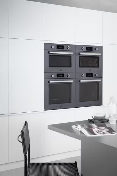 Bank of Bertazzoni 45cm Combi-Microwave Oven and 60cm ovens in Carbonio/Black
