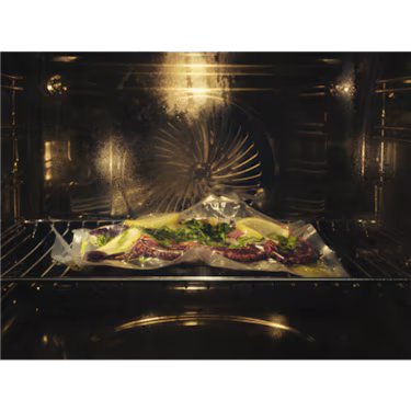 AEG 60cm Steam Oven Matte Black NBP9S83PAT showing inside the oven during a sous vide cooking program.