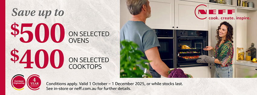 Neff oven advertisement with a man and woman in a kitchen.