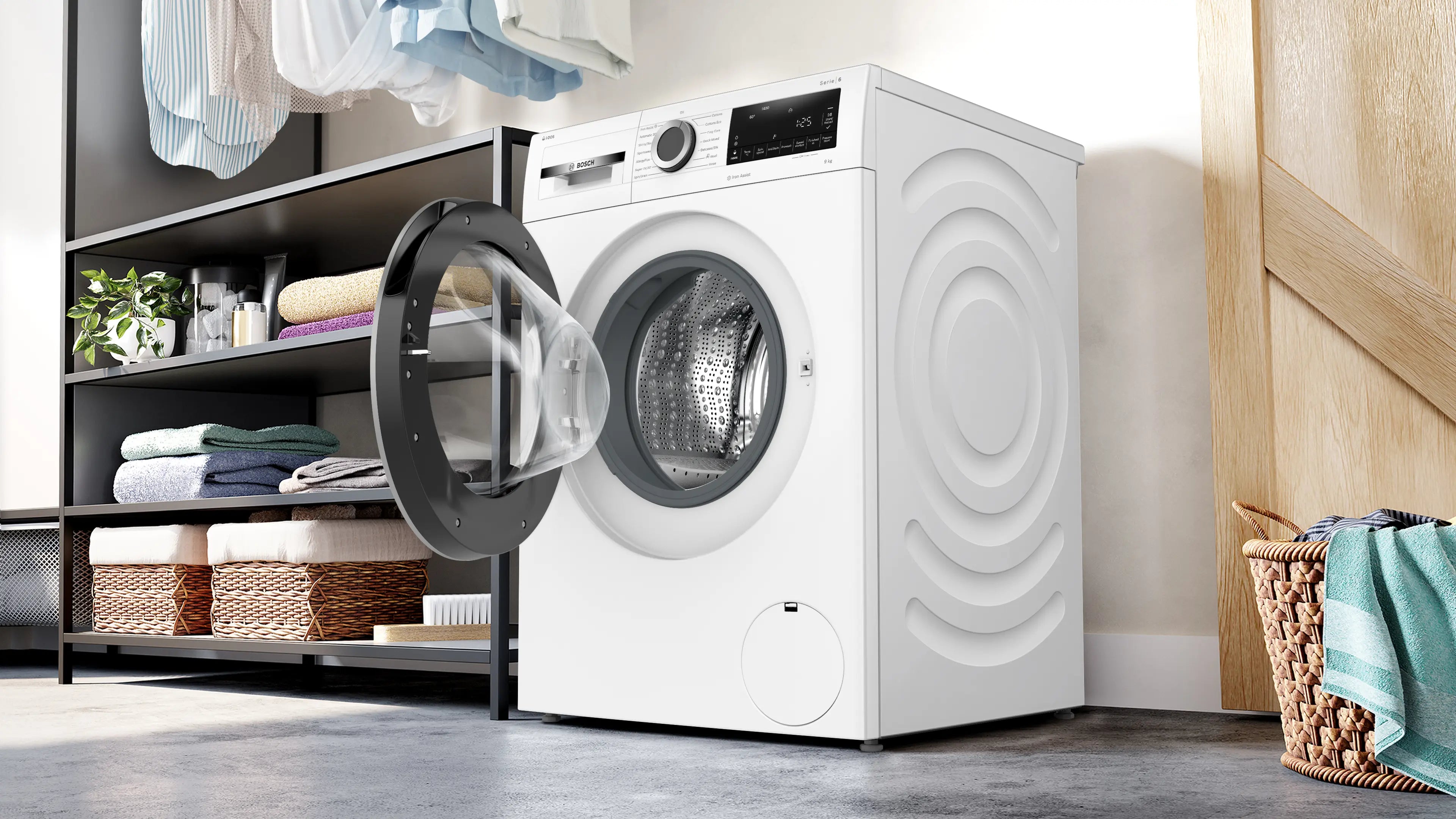 Bosch Front Load Washer 9kg WGG244F0AU placed in a laundry looking at the rigth of the product