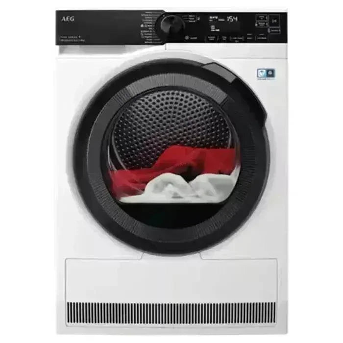 AEG front load dryer with red and white clothes inside, modern kitchen appliance