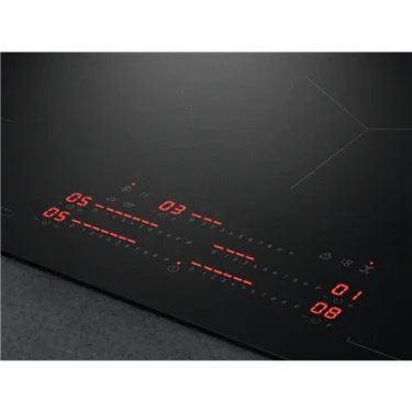 Sleek black induction cooktop with red digital controls for modern kitchen appliances