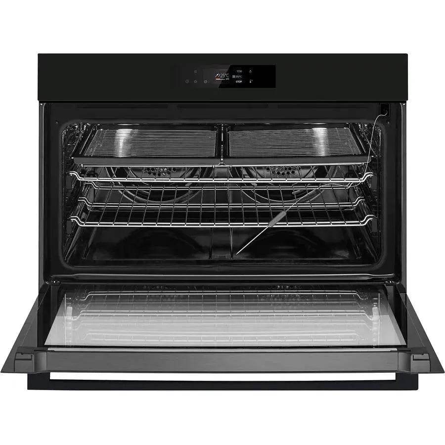 Black built-in oven with digital display and multiple racks, perfect for modern kitchen appliances