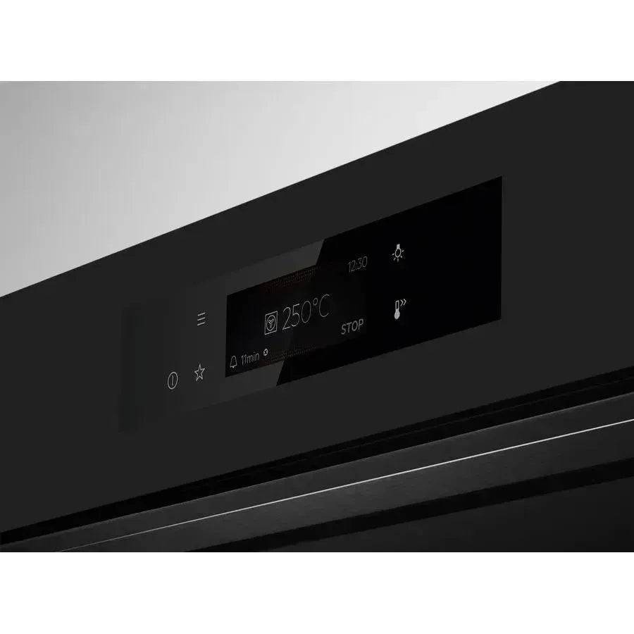 Modern black oven control panel displaying 250°C with digital touch interface and timer settings