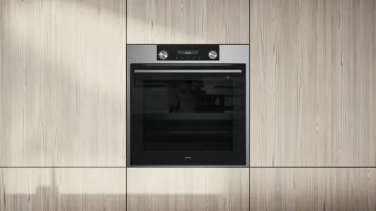 Falcon premium European glass black upright 1100mm induction cooker in modern kitchen setting