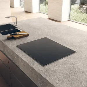 Falcon premium European glass black upright 1100mm induction cooker on modern kitchen countertop
