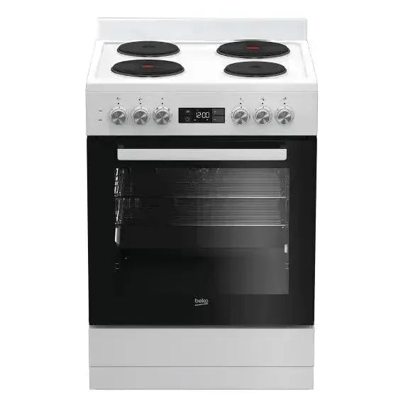 White Beko electric stove with four burners and oven, modern kitchen appliance
