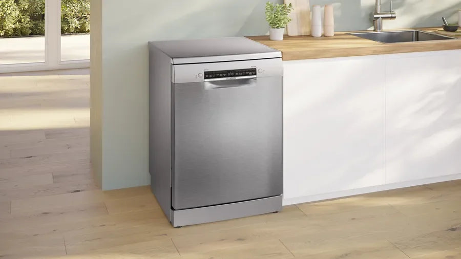 Stainless steel dishwasher in modern kitchen setting