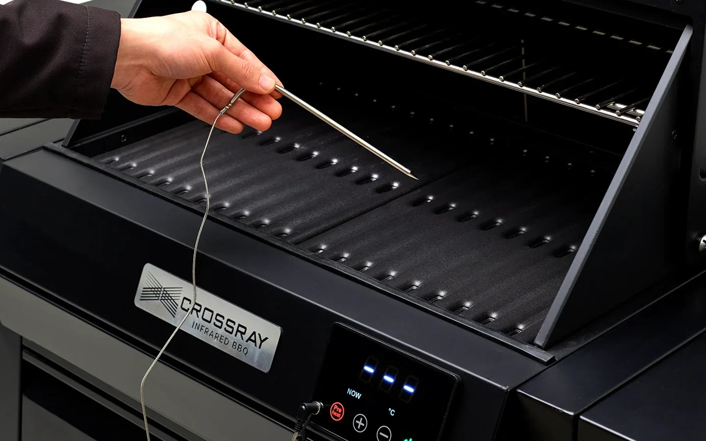 Crossray Infrared BBQ grill with digital controls and temperature probe in use