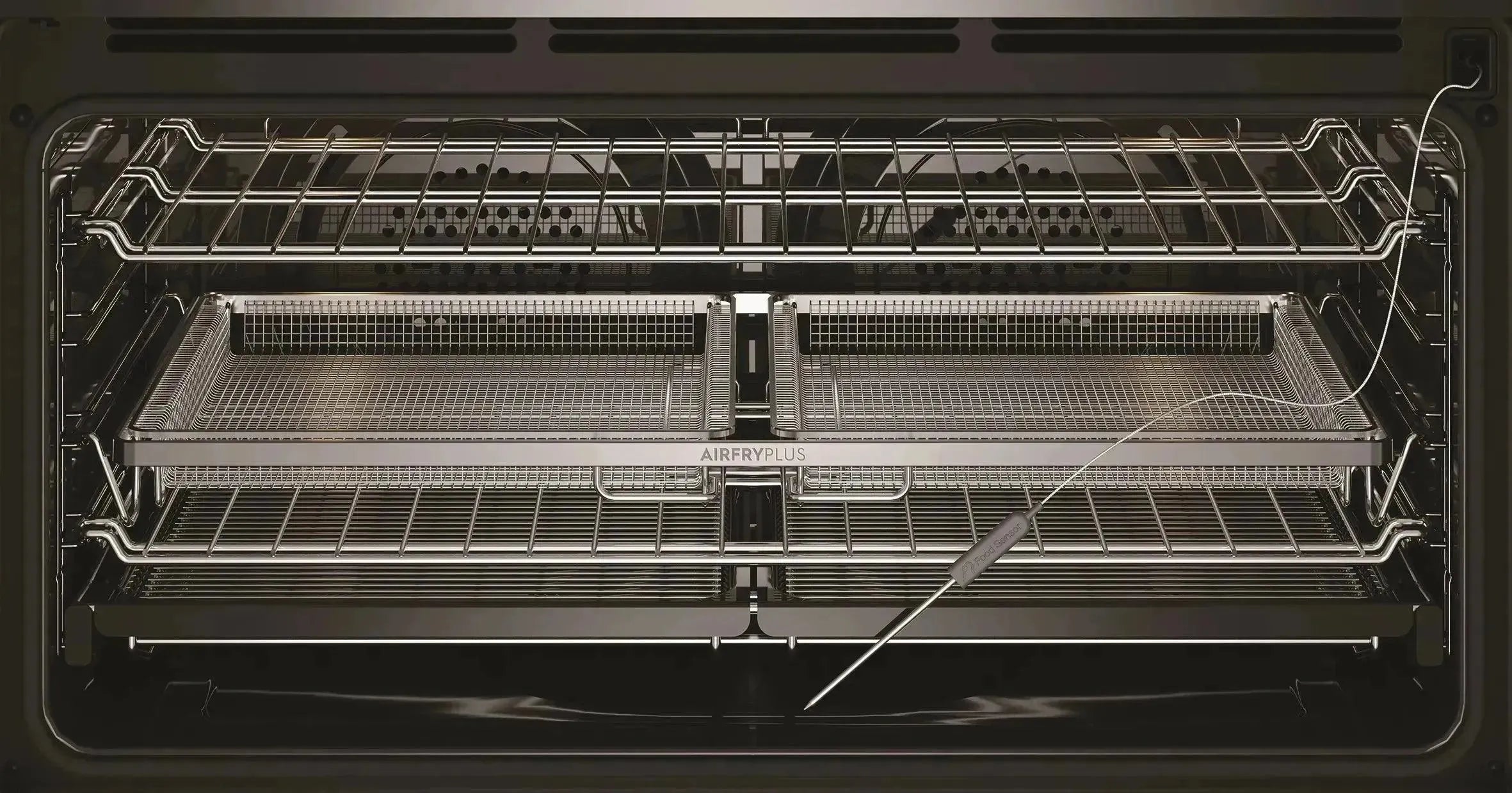 AirFry Plus oven interior with dual air fry baskets and food probe, showcasing modern kitchen appliance features