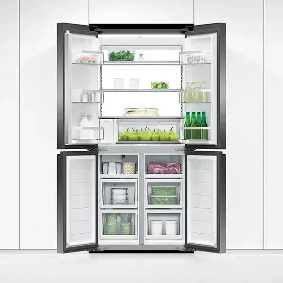 Modern French door refrigerator with open doors, showcasing organized fresh produce and beverages inside.