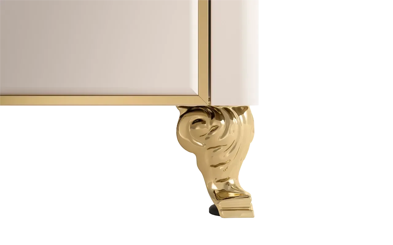 Luxury kitchen cabinet with ornate gold leg and trim, designer appliance gallery detail