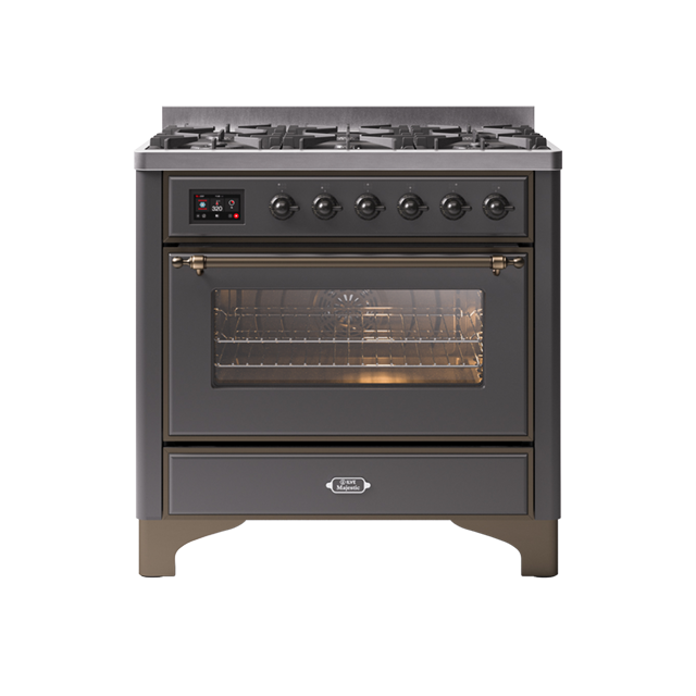 Dark gray freestanding gas range with oven, brass handles, and control knobs for modern kitchen design