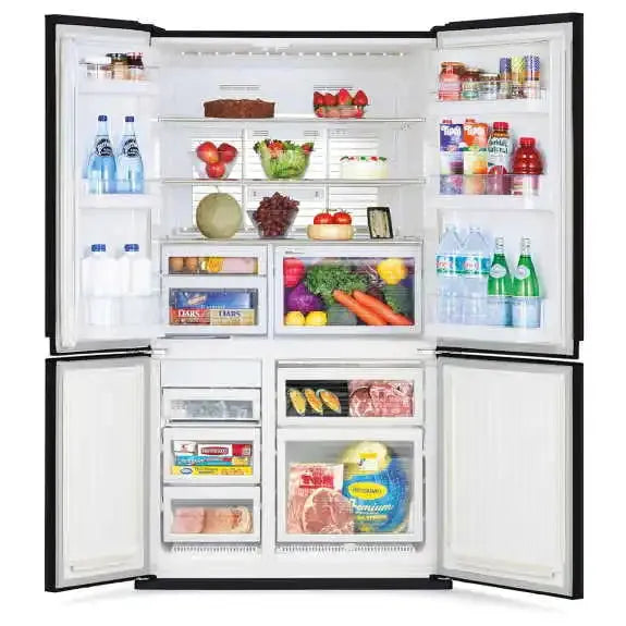 Fully stocked side-by-side refrigerator with fresh produce, drinks, and frozen foods in organized compartments
