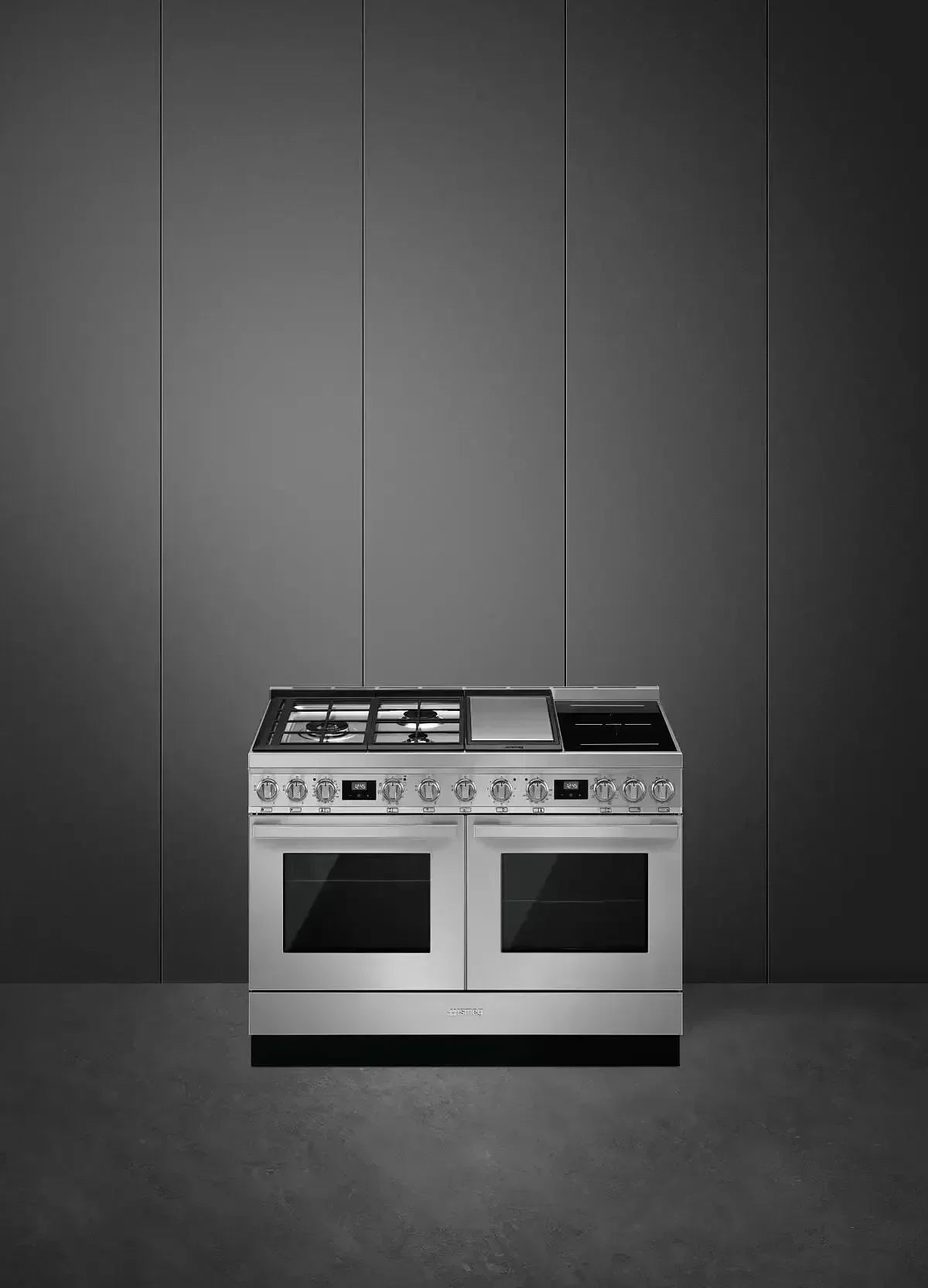 Stainless steel dual fuel range with gas burners, griddle, and double ovens for modern kitchen design