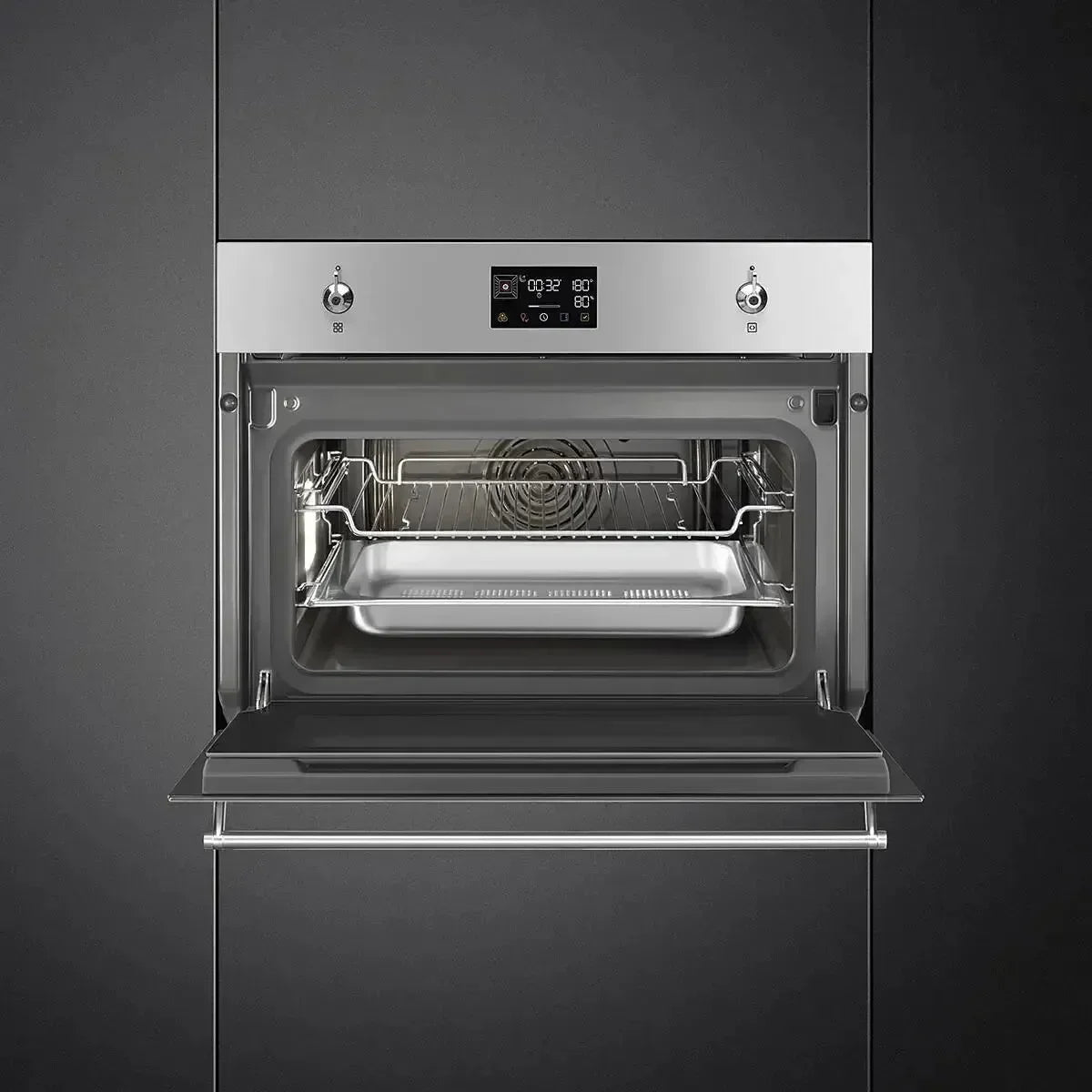 Modern built-in oven with digital display, open door, and baking tray inside, sleek stainless steel design