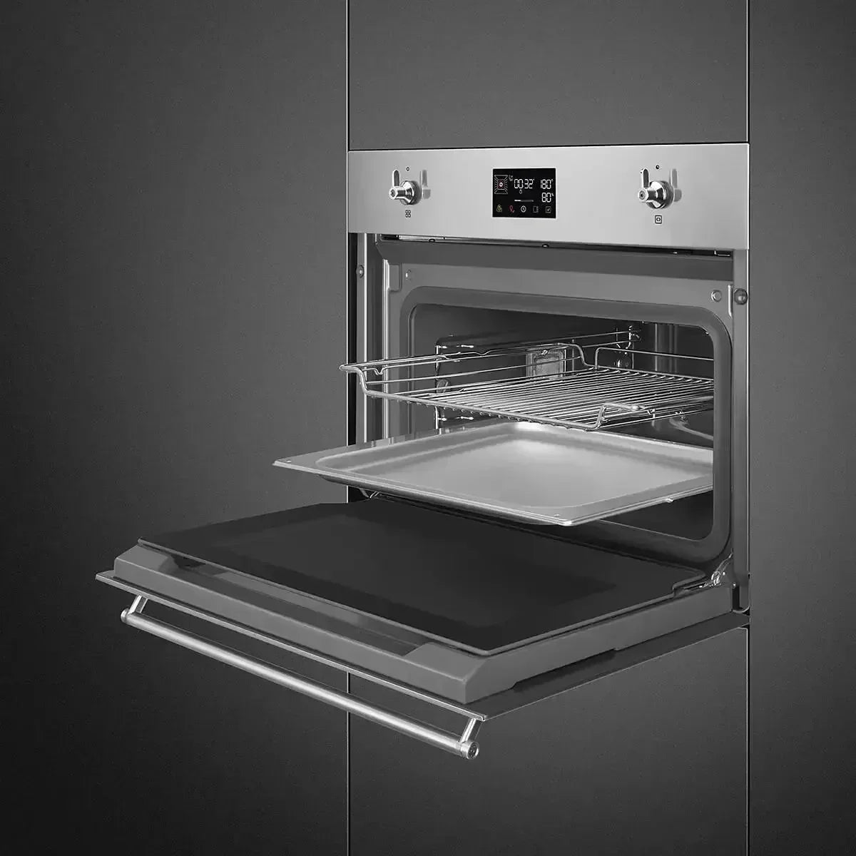 Stainless steel built-in oven with digital display and open door showing racks and baking tray