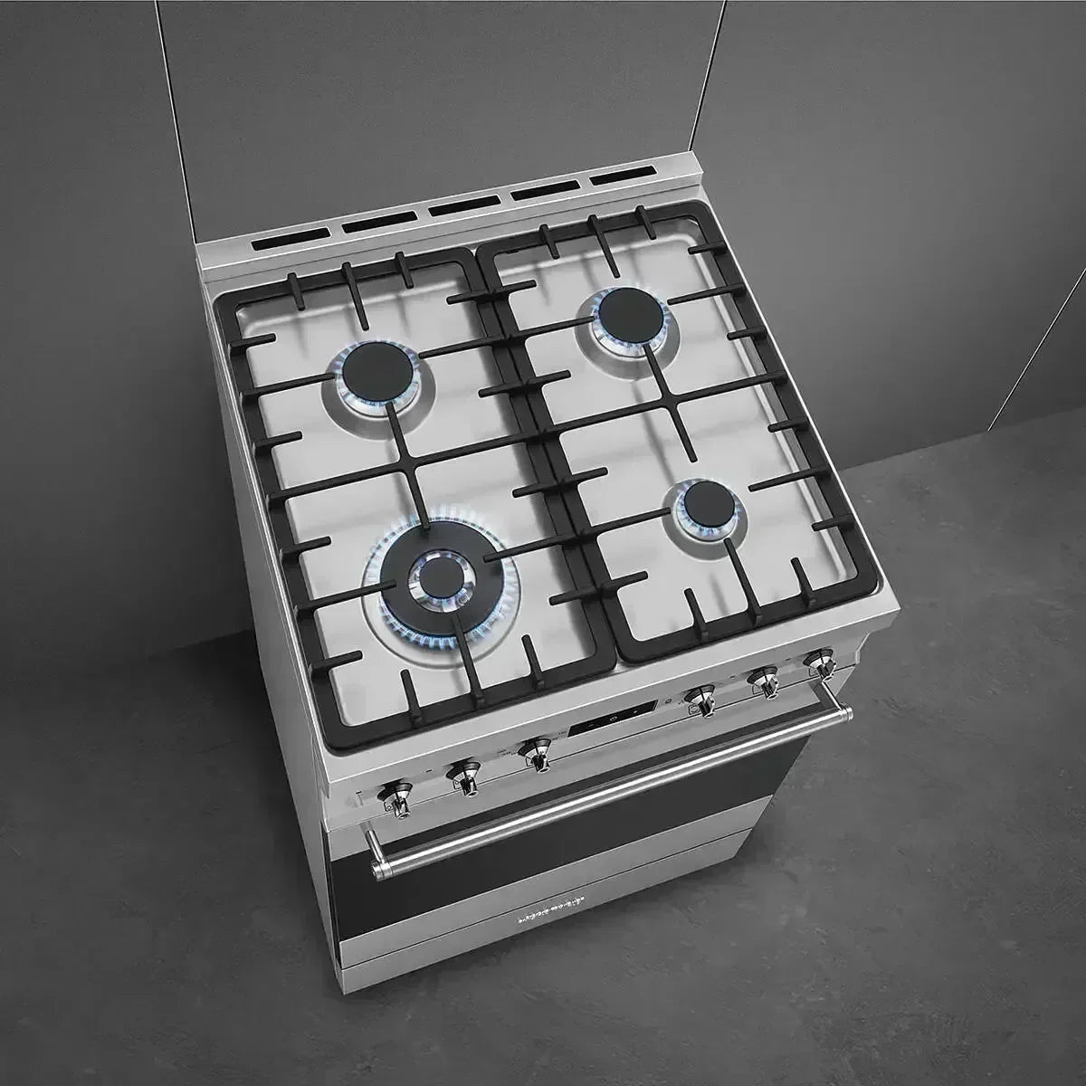 Stainless steel gas cooktop with four burners, modern kitchen appliance for designer kitchens