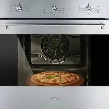 Stainless steel oven baking pizza, modern kitchen appliance with control knobs and interior light