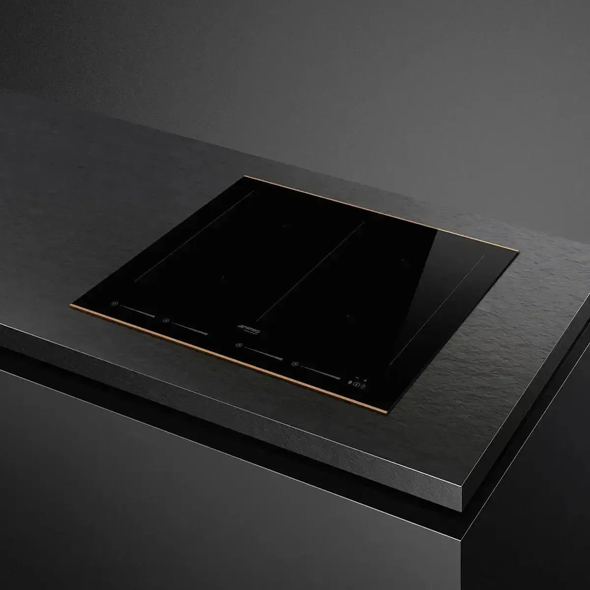 Sleek black induction cooktop with touch controls on modern kitchen countertop